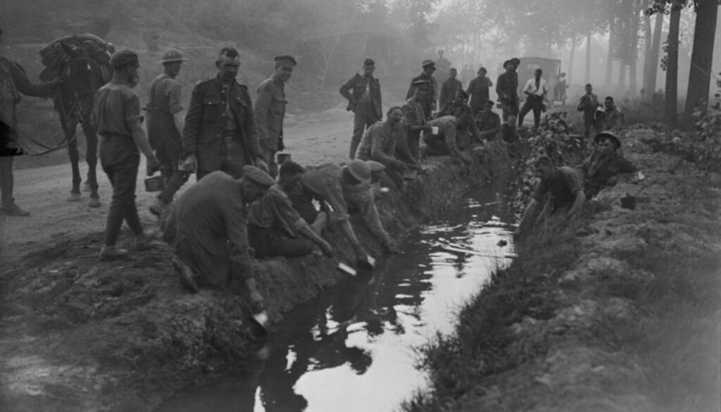 21_Canadians filling their water bottles etc. Amiens. August, 1918.